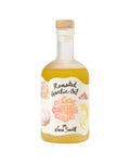 Bottle of roasted garlic oil with a label on a white background