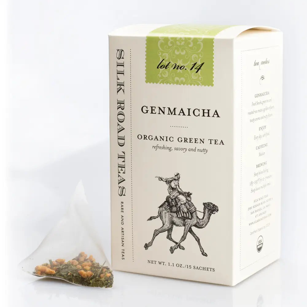A box of Genmaicha organic green tea from Silk Road Teas, shown with a single tea bag containing loose tea leaves on a clean white background.