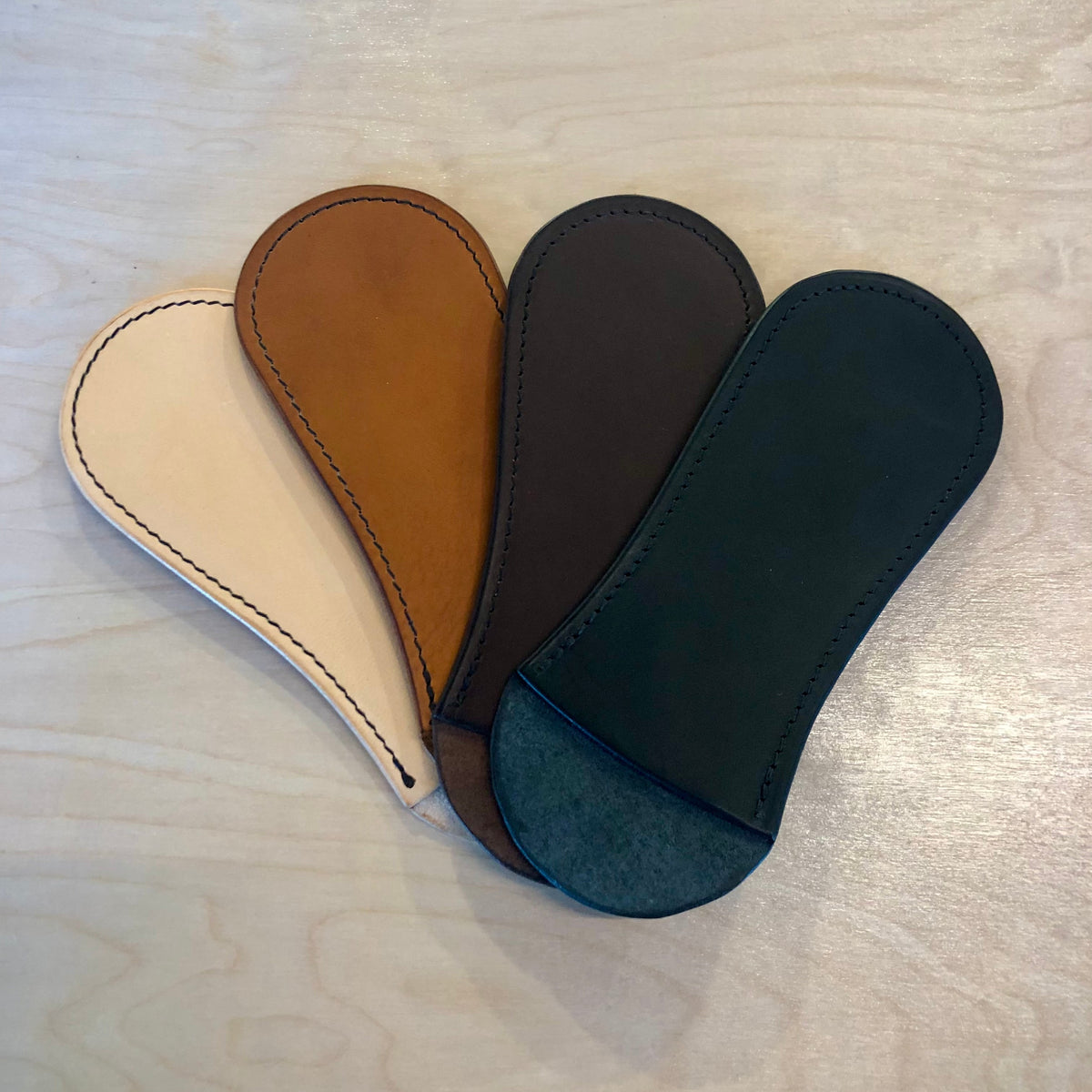 Leather cast iron handle covers in four colors